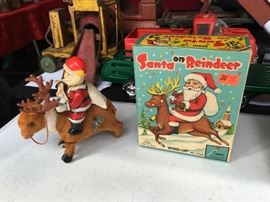 WIND UP SANTA ON REINDEER WITH BOX