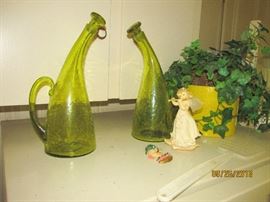 CURVED GREEN GLASS OIL CONTAINERS WITH GLASS TOPS, HANDLES