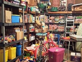 Puzzles, a bicycle, and childrens toys left over from the days of doing daycare.