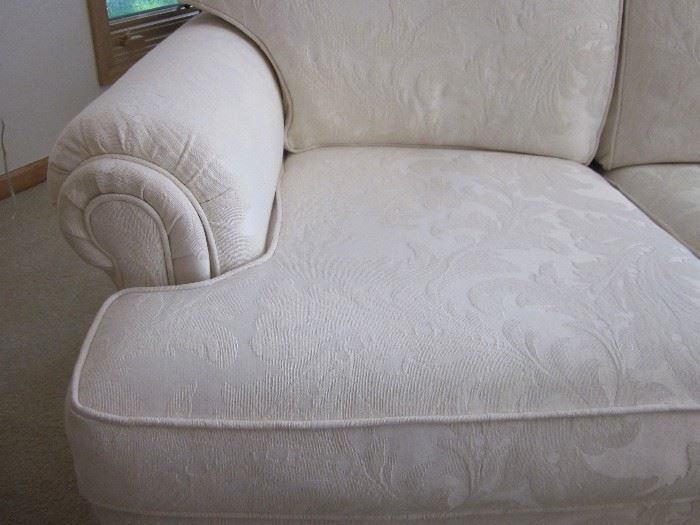 Thomasville 3-cushion sofa, attached pillow back, rolled arms, off-white damask style fabric.  79" long