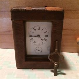 Carriage Clock with Case and Key.
Glass sides reveal mechanism