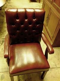 oxblood tufted back chair with nailhead trim and straight legs