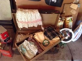 trunk findings, old baby/kids clothes, old advertising gasoline tins