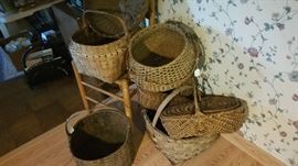 Collection of primitive baskets, large, including a butt basket
