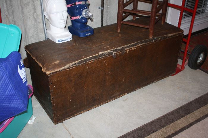 Antique bench with horse hair in seat.