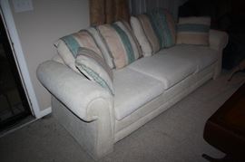 Vintage white sofa with pillow