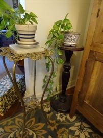 1. Antique Brass plant stand with marble insert. 2. Mahogany plant stand with round -curved base.