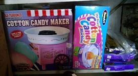 two cotton candy makers with accessories 
