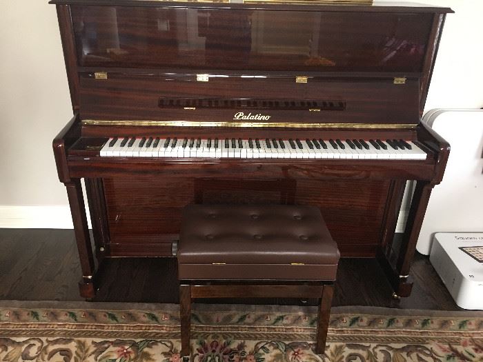 Palatino brown lacquered piano and bench in excellent condition.