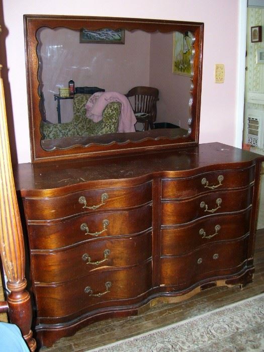 Vintage serpentine dresser