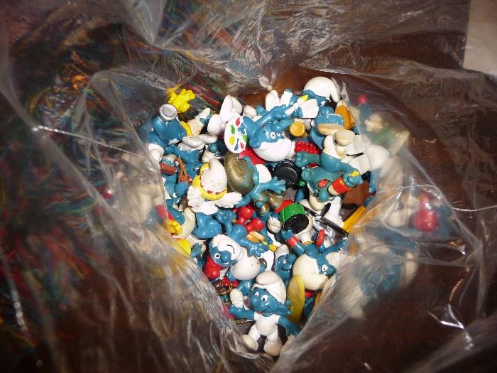 large assortment of Smurfs = including houses