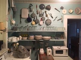 Antique 1930-1940's era enamelware, strainers, coffee pots, dishes, roaster, also microwave, toaster, blender