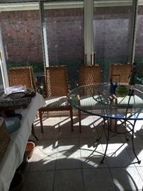 Set of 4 or 6 wood dining rooms chairs with rattan backs & glass / metal kitchen or breakfast table. 