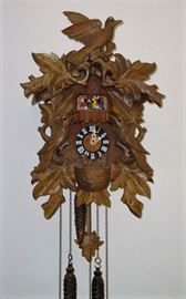BLACK FOREST CUCKOO CLOCK WITH DANCERS - SWISS MOVEMENT