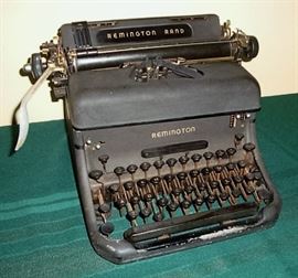 ANTIQUE REMINGTON TYPEWRITE WITH ORIGINAL DUST COVER