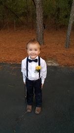 My grandson at a wedding last night and no he isn't for sale...he is priceless...just wanted to share.