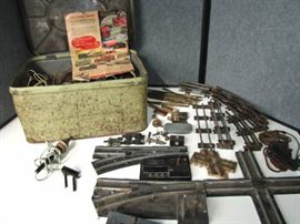 arge tin filled with tracks and more