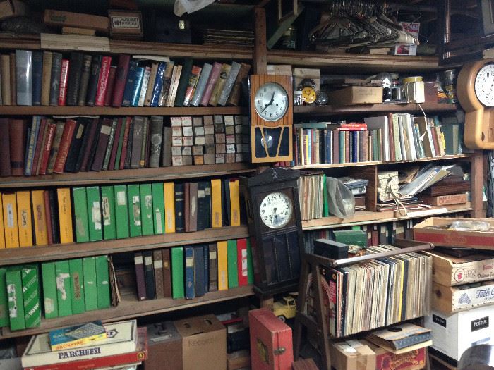 Each box on the shelf contains many records.