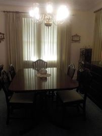 Dining table with pads