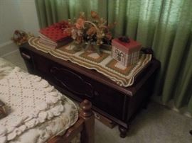 Chest and 1 of 3 beds