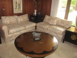 Medallion Limited Tables. Split sofa, swag lamp