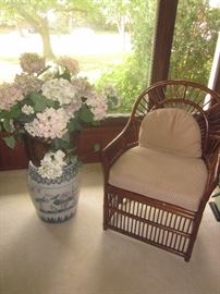 Rattan chair ( matching pair) Ceramic pedestal and flower arrangement