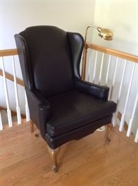 the other black leather wingback, one of which has a small split on the side - I really had to look for it!