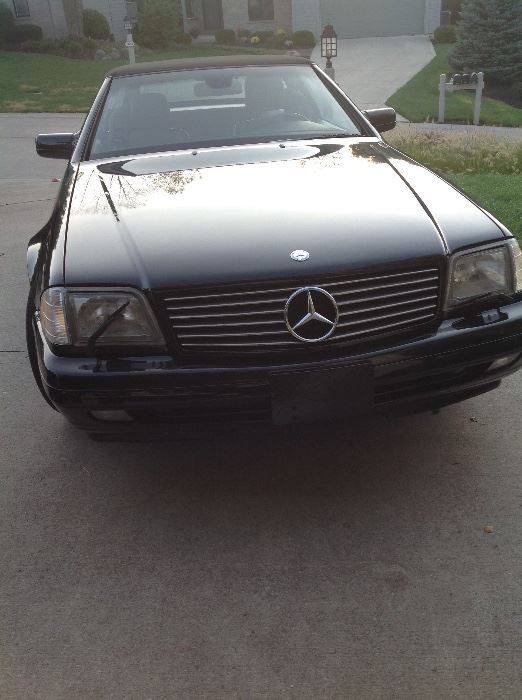 1997 Mercedes 500SL convertible.  99,000 miles, clean, just came from Bolyard's with a good bill of health.  Will need new driver side mirror(faded image) and new antenna