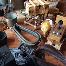 MUCH MORE VINTAGE AND ANTIQUE ITEMS. HORSE COLLARS, TELEPHONE WITH ALL THE INSIDES AND SEE THE KID'S PUNCHING BAGS PUNCHING BAG?