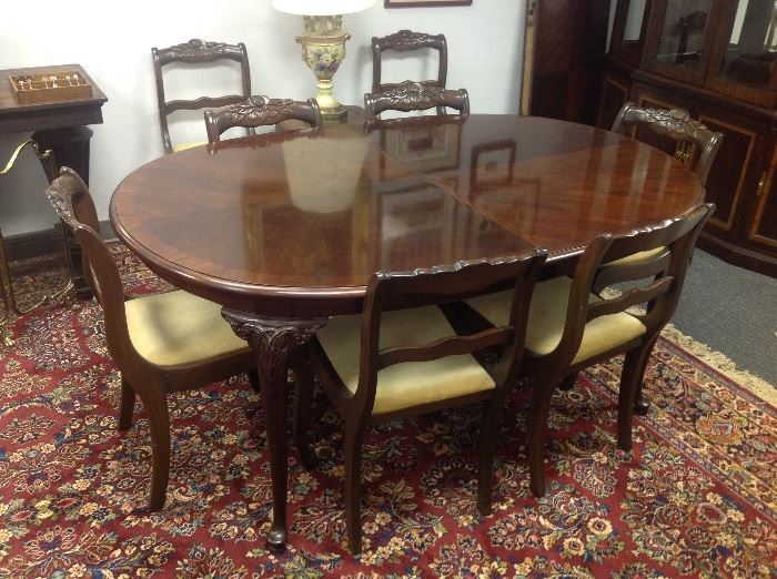 Oval Mahogany Dining Table w/ Two Leaves and Eight Mahogany Rose Motif Dining Side Chairs