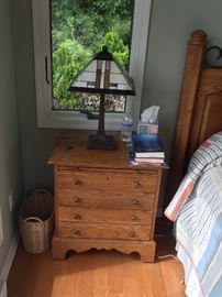One of pair of oak nightstands