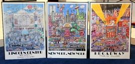 Framed posters by Charles Fazzino.