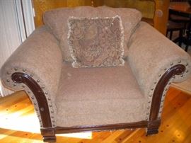 Oversized rolled arm/nail head chair and ottoman