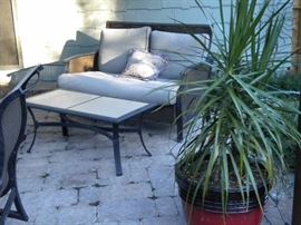 Patio furniture galore, coffee table, rocking chairs, chairs, ottomans, loveseat and more