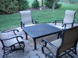 Patio furniture galore, coffee table, rocking chairs, chairs, ottomans, loveseat and more