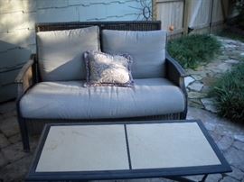 Patio furniture galore, coffee table, rocking chairs, chairs, ottomans, loveseat and more