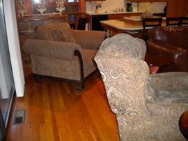 Oversized rolled arm chair with nail head accents and ottoman