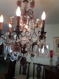 Elegant crystal chandelier with grape clusters