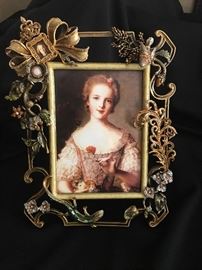 Jay Strongwater picture frame for an 8x10 photograph.  The price tag is still on the back from Neiman Marcus.  She paid 1800.  It is a limited edition 103/350.  Comes in its original box.