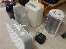 Small appliances - space heaters, fans, dehumidifier, Rowenta iron, pencil sharpener, vacuums, upright freezer, wine coolers