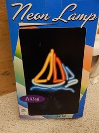 Perfect for Lake Lanier! Neon lighted sail boat. New. Never used.