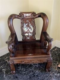 Beautiful hand carved chairs with inlay from the meditation room