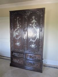 Ornate rosewood with inlay armoire