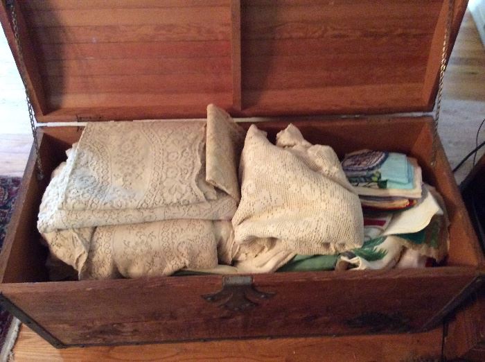Chest of linen tablecloths and hand towels