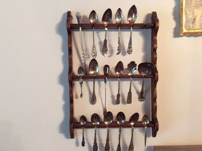 Large collection of souvenir spoons