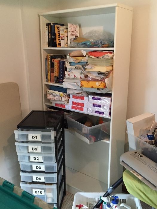 White bookcase, storage containers and tons of office supplies