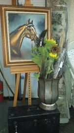 Many framed pictures and prints