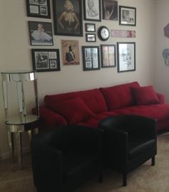 Red Sleeper Couch; Black Chairs; Mirrored End Tables