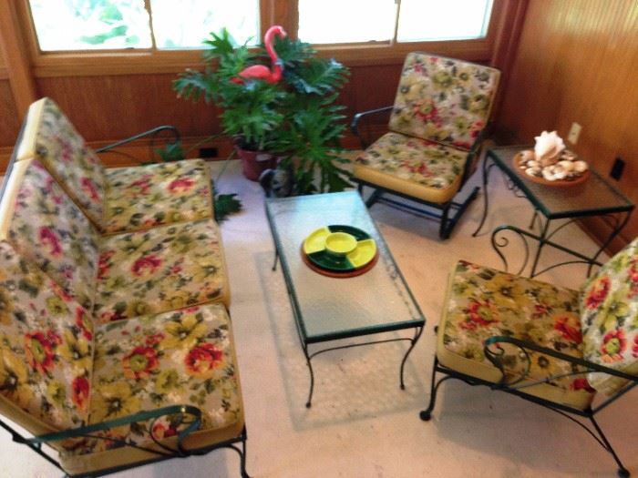 mid century wrought iron patio . original canvas and vinyl cushions are in great shape, had been covered in canvas for 20 years and inside