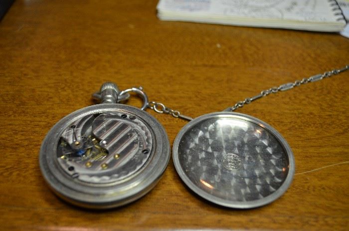 Antique Pocket Watch - New York Standard Watch Company USA inside has same with the numbers 3636235 and on the backing Silverode with the numbers 704824 the circle on the backing also has a crown with a cross and other emblems.